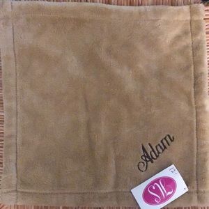Tan baby blanket with Adam monogram
